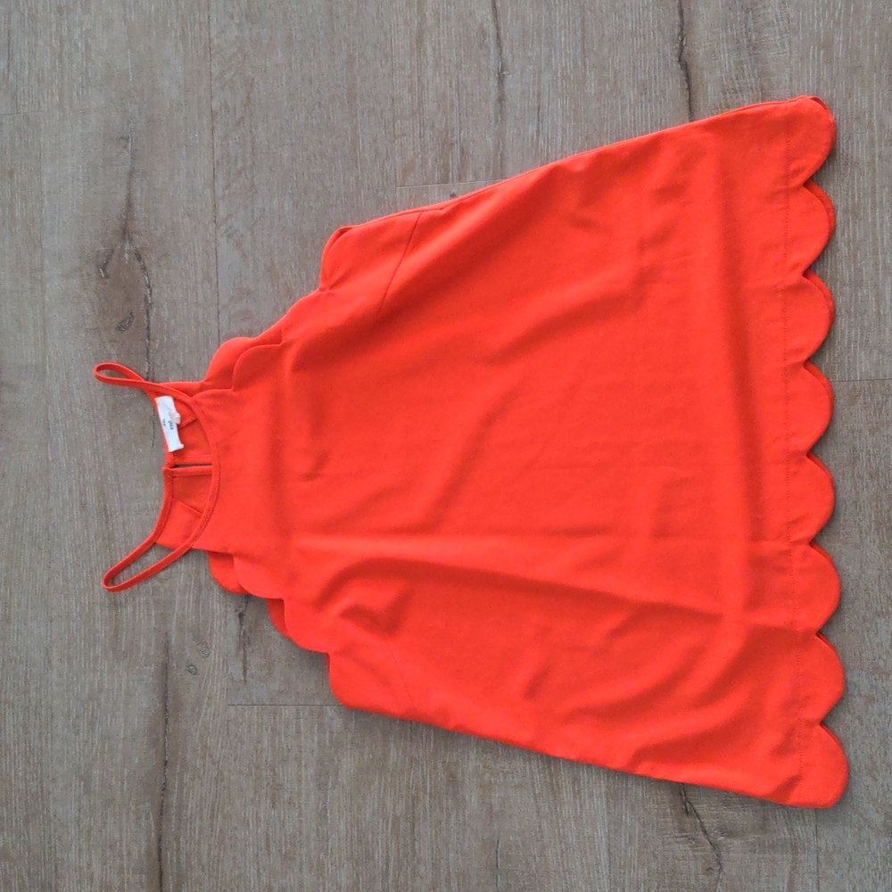 Orange top never worn.